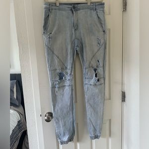 Men’s cinched bottom ripped jeans, jogger jeans